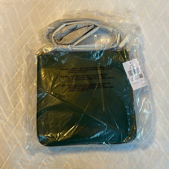 Green Kate Spade purse, brand new with tags and packaging, small blemish. - Picture 2 of 6